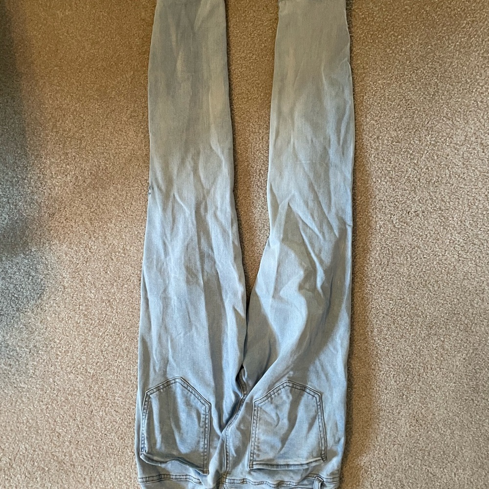 Women’s light blue ripped skinny jeans